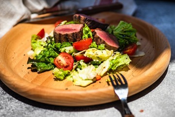 Steak salad with fresh lettuce