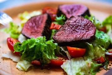 Steak salad with fresh lettuce