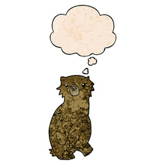 cartoon bear and thought bubble in grunge texture pattern style