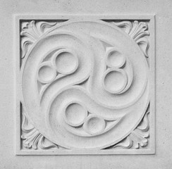 Carving by stone. Element of the decor of the wall