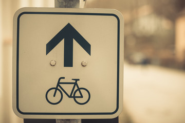 Bicycle lane sign on a pole