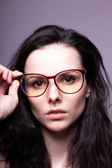 Fototapeta na wymiar beautiful girl with glasses portrait studio
