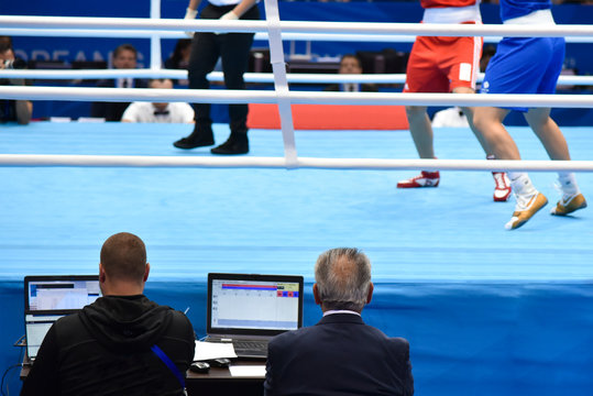 Judges Judge Boxing Match In The Ring