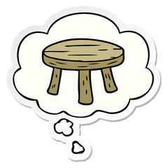 cartoon small stool and thought bubble as a printed sticker