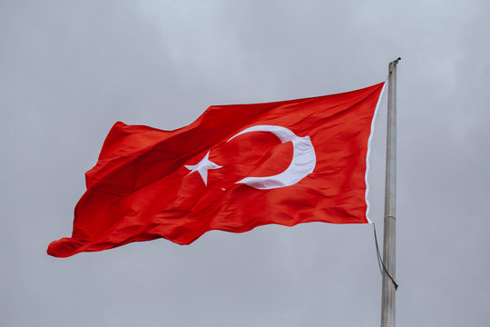 Turkey flag waving on the wind in the evening