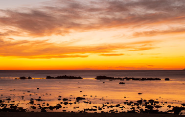 Fototapeta na wymiar Panorama of beautiful sunset over beach