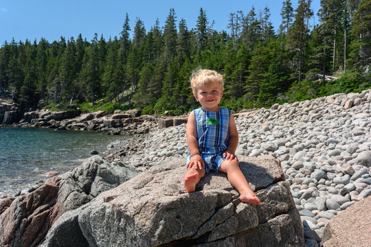 Child On Large Rock In Acadia National Park