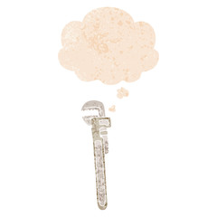 cartoon adjustable wrench and thought bubble in retro textured style