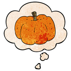 cartoon pumpkin and thought bubble in grunge texture pattern style