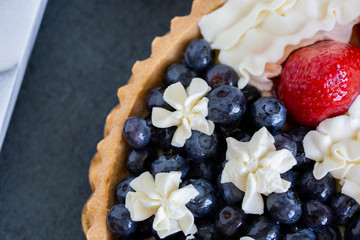 Obraz na płótnie Canvas Patriotic American Flag Themed Fruit Tart Dessert