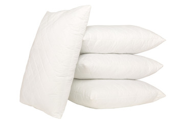 Fototapeta na wymiar four white pillows on pure white background, stock photography