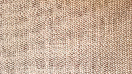 An backdrop with bright light brown abstract pattern for background