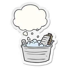 cartoon old washboard and bucket and thought bubble as a printed sticker