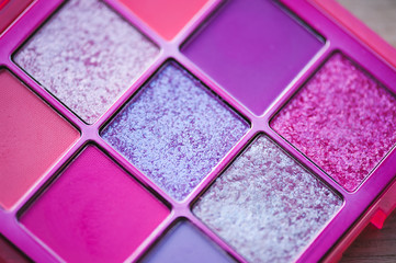 Colorful eyes shadow palette closeup. Make-up product. Top view.