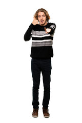 Full-length shot of Blonde man making phone gesture and pointing front over isolated white background