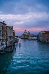 Naklejka premium Beautiful view on Basilica di Santa Maria della Salute in golden evening light at sunset in Venice, Italy