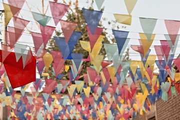 Colorful festive decoration-pennant garlands or buntings. Street in Hotan-Xinjiag-China-0130