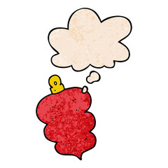 cartoon christmas bauble and thought bubble in grunge texture pattern style