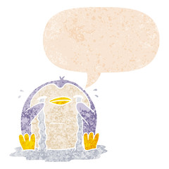 cartoon crying penguin and speech bubble in retro textured style