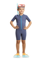Boy in a wetsuit, diving mask and flippers posing