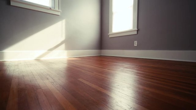 Empty Bedroom with Hardwood Floor Move Forward on Corner. view moves forward on a gray bedroom corner with hardwood floor