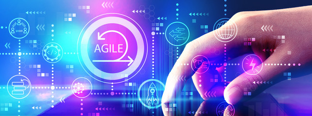 Agile concept with hand pressing tablet computer screen