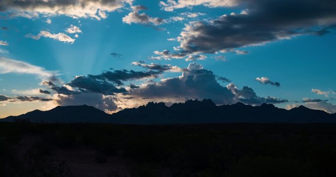 Sunrise Over Mountains Timelapse. sunrises over a mountain range in New Mexico timelapse with flare
