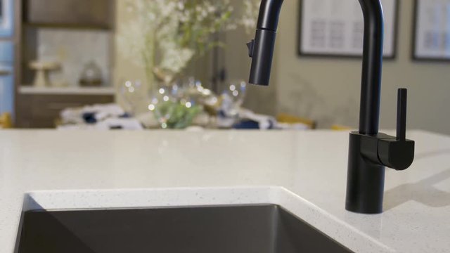 Kitchen Faucet Detail Move Left. view moves left on a kitchen island sink and faucet
