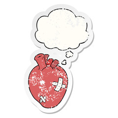 cartoon heart and thought bubble as a distressed worn sticker