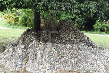 stone art around the tree
