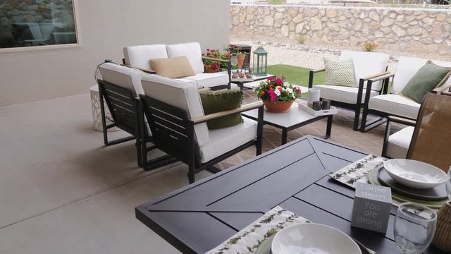 Backyard Patio Scene Reveal From Outside Eating Area. view moves up from a eating area in a backyard to show a patio setting