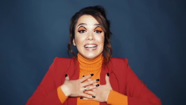 Attractive girl actively gesticulating with hands explaining point of view