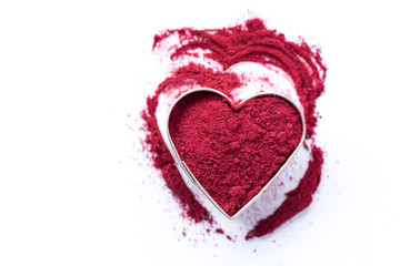 Beet Powder in a Heart Shape