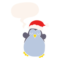 cute christmas penguin and speech bubble in retro style