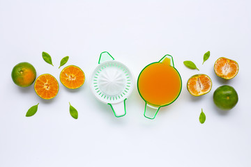 Citrus orange juicer with oranges on white