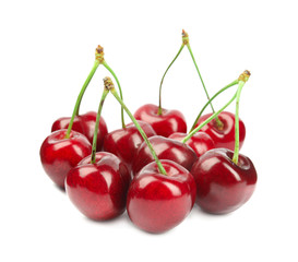 Heap of ripe sweet cherries on white background