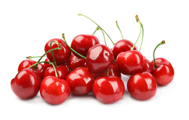 Obraz na płótnie Canvas Heap of ripe sweet cherries on white background