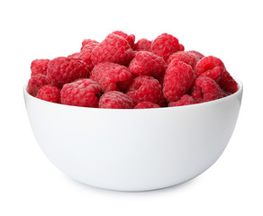 Bowl of delicious fresh ripe raspberries on white background