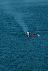 Two Male Rowers In A Double Racing Boat With Synchronous Oar Stroke