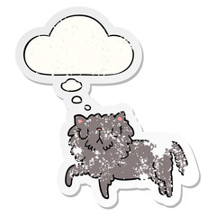 cartoon cat and thought bubble as a distressed worn sticker