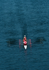 Four Male Rowers In A Quad Racing Boat With Synchronous Oar Stroke © grafxart