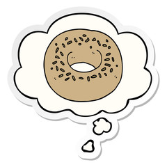 cartoon donut and thought bubble as a printed sticker