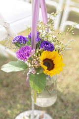 bouquet of flowers in vase on white background