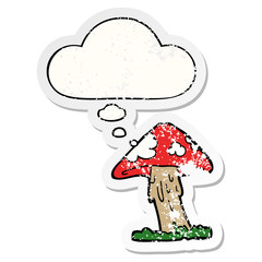 cartoon mushroom and thought bubble as a distressed worn sticker