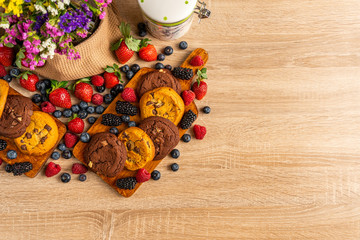 Assorted mix of cookies, wild berries and flowers