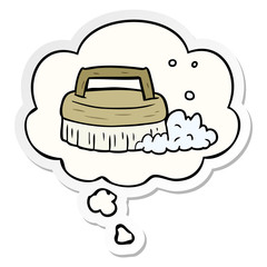 cartoon scrubbing brush and thought bubble as a printed sticker