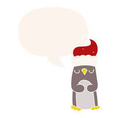 cartoon christmas penguin and speech bubble in retro style