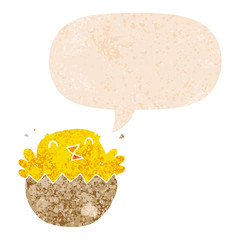 cartoon hatching chick and speech bubble in retro textured style