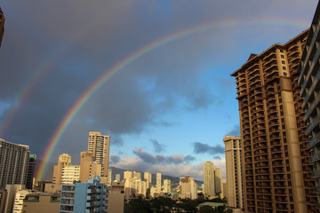 A rainbow in Hawaii, Honolulu landmark on a cloudy day