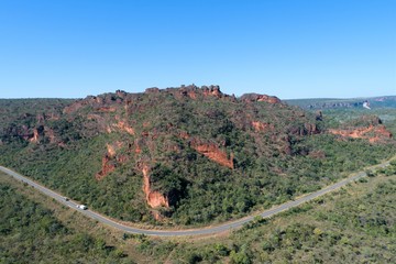 Aerial view of MT 241 road, way to Chapada dos Guimarães, Mato Grosso, Brazil. Great landscape. Travel destination. Vacation travel. Touristic point.